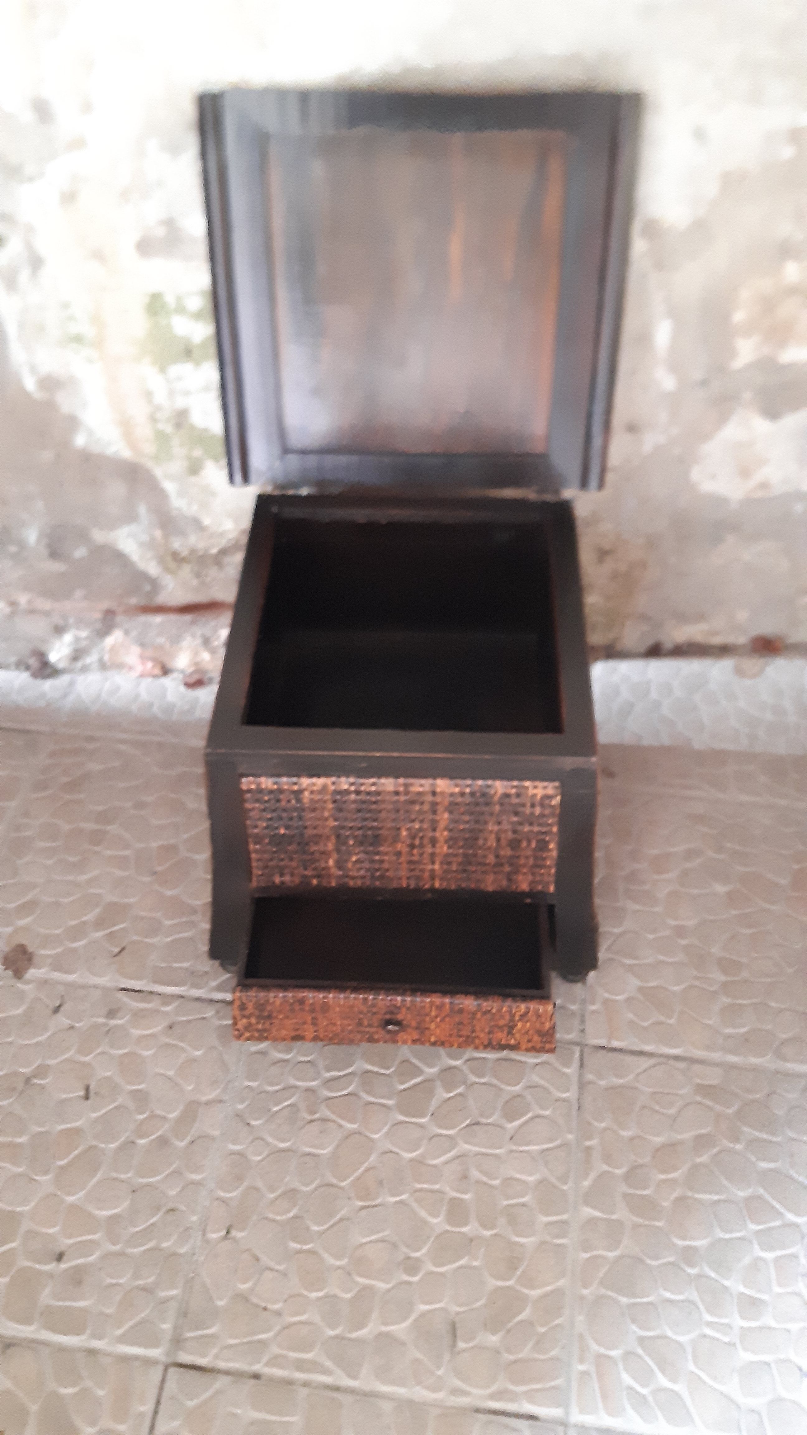 Wooden chest and braided rice straw