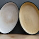 Pair of enamelled sheet metal dishes