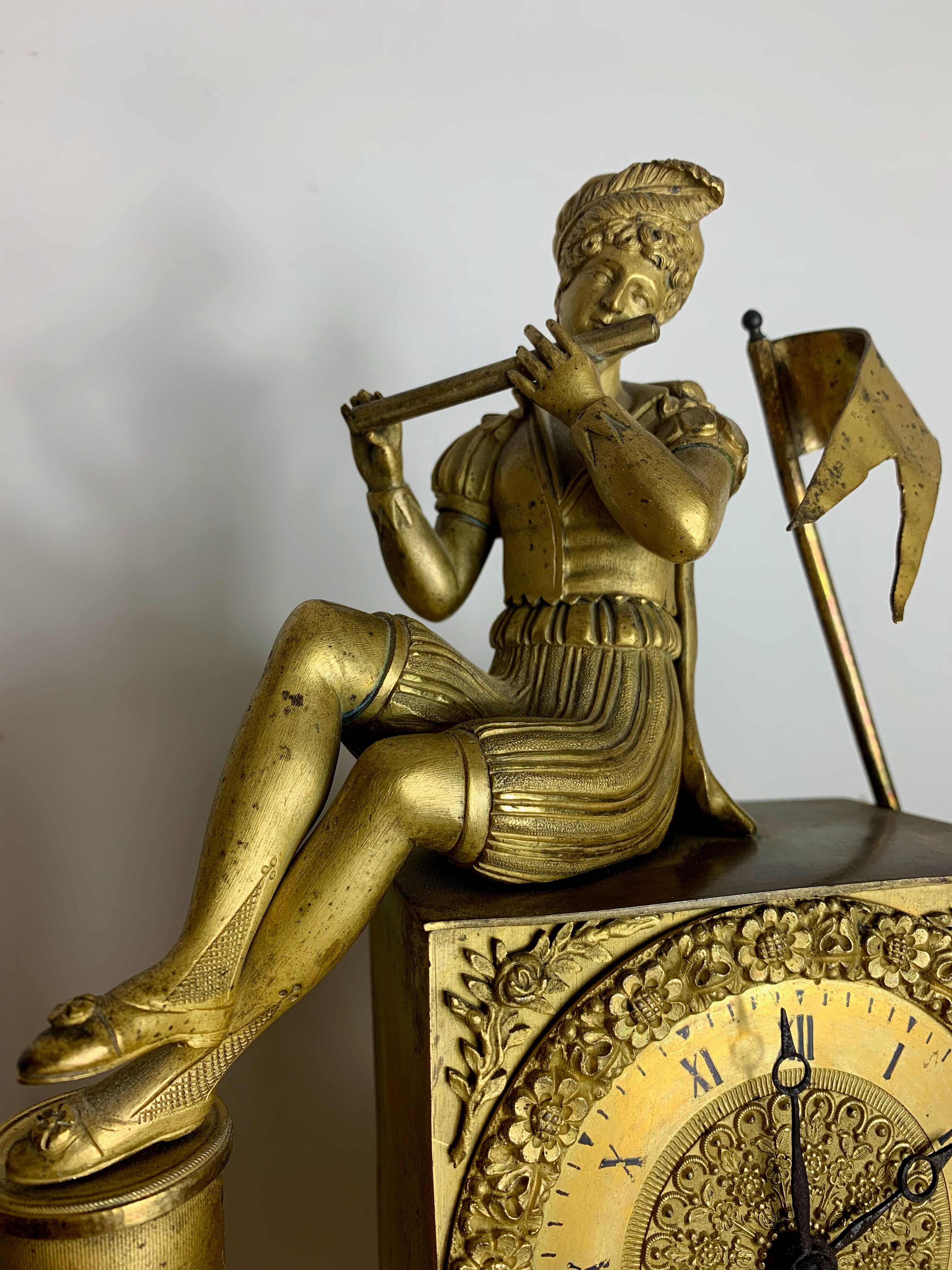 Period clock restoration in gilded bronze