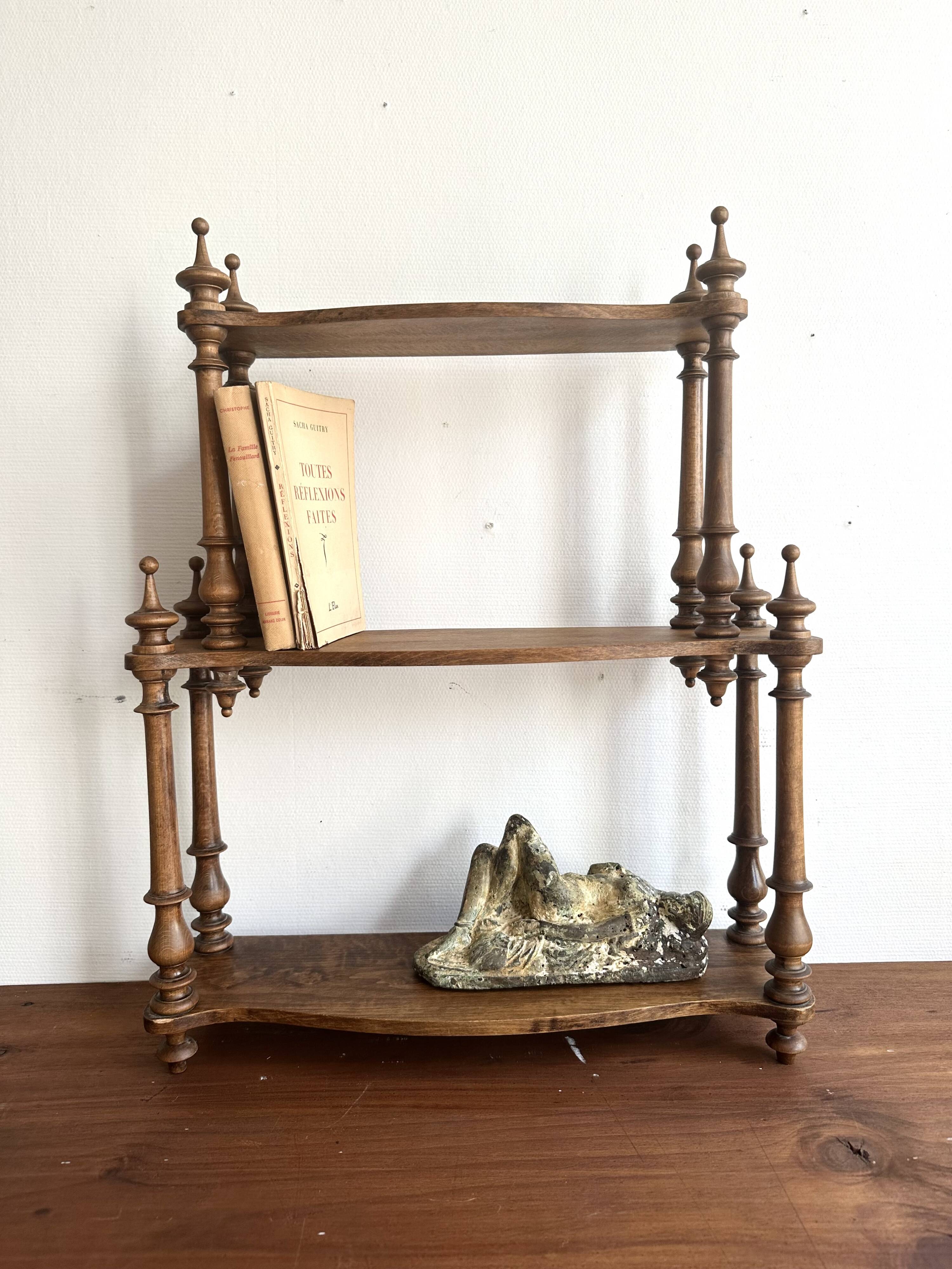Antique turned wooden shelf with three levels, around 1900.