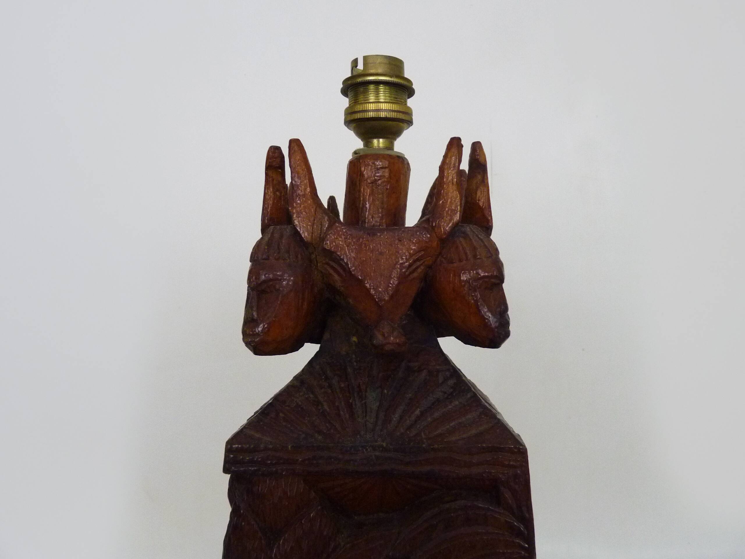 Old large lamp from Malagasy School and Tananarive in carved wood. Art Deco.