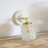 Carved glass wall lamp