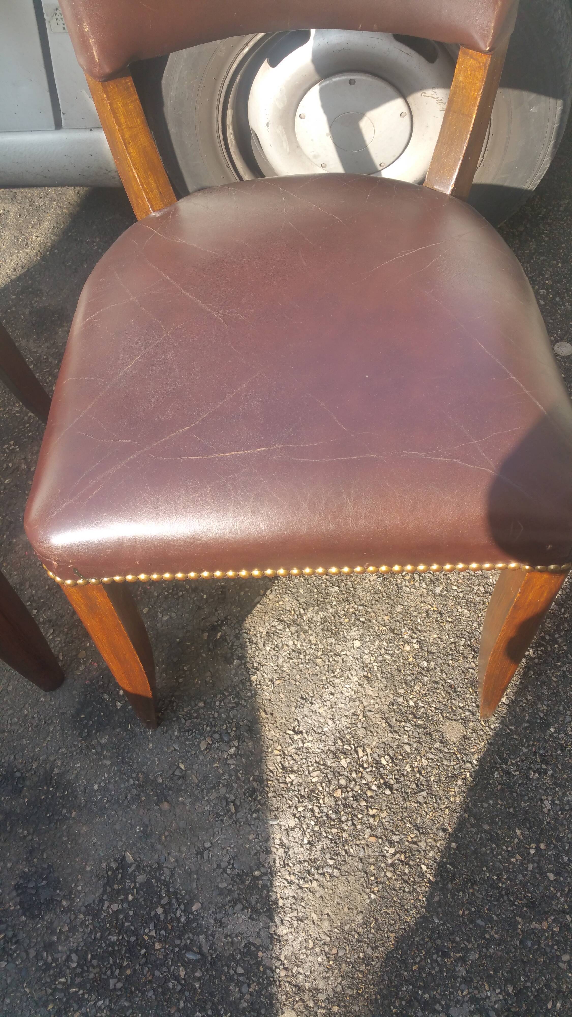 Lot of leather and vintage wood chairs