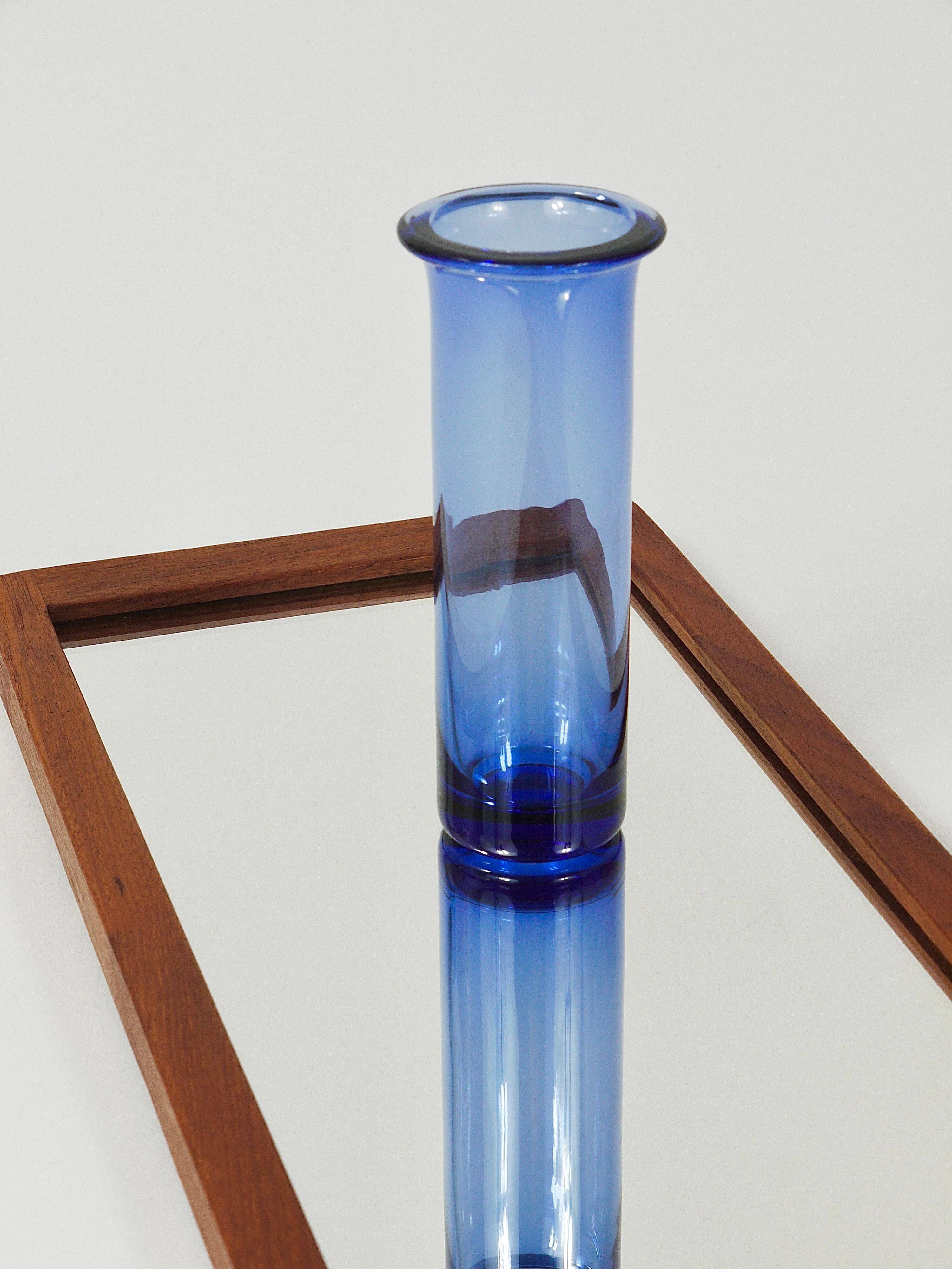 Danish wall mirror by Jacob Hermann & Per Lütken and Holmegaard glass vase, 1960s.