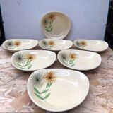 Set of 7 antique St. Clement Sirius pattern ceramic plates