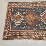 Antique kazak rug blue ground