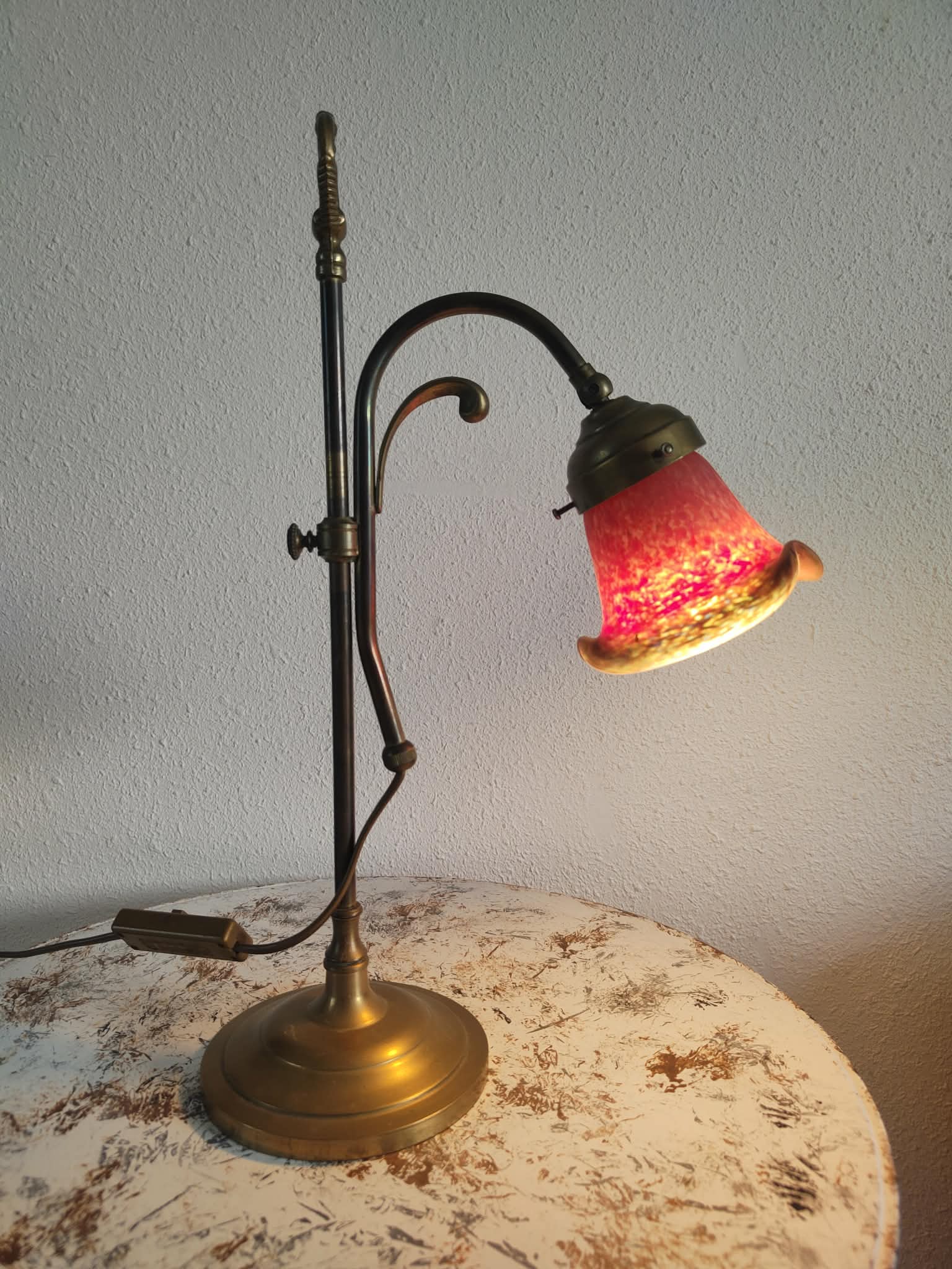 Brass articulated lamp with glass paste signed art of France.