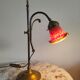Brass articulated lamp with glass paste signed art of France.