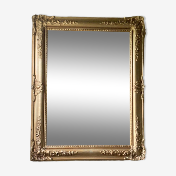 Miroir doré ancien à motif