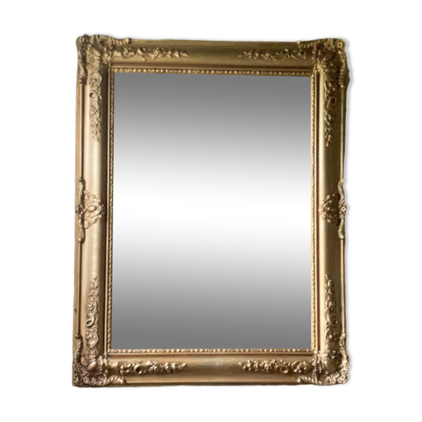 Miroir doré ancien à motif