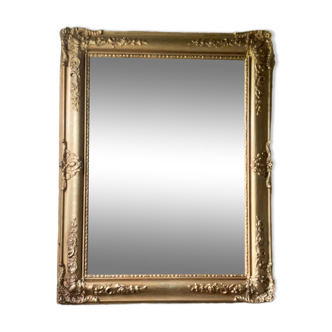 Miroir doré ancien à motif