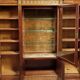 Important showcase library in fine wood and marquetry, stamped.