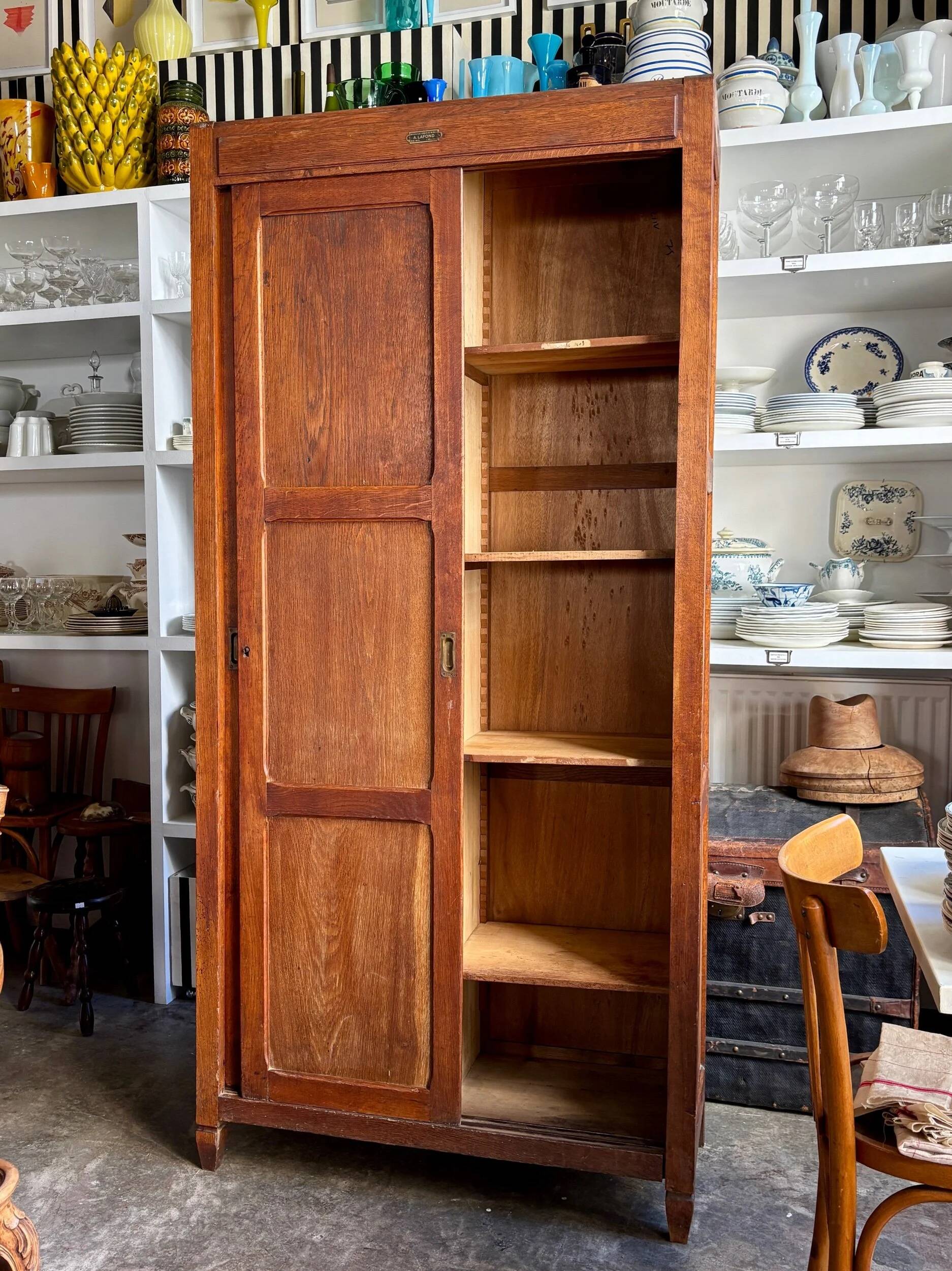 Dark wood sliding door wardrobe A. Lafond (Reims)