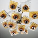 12-light Mazzega chandelier in amber and clear murano glass and chrome. Ita