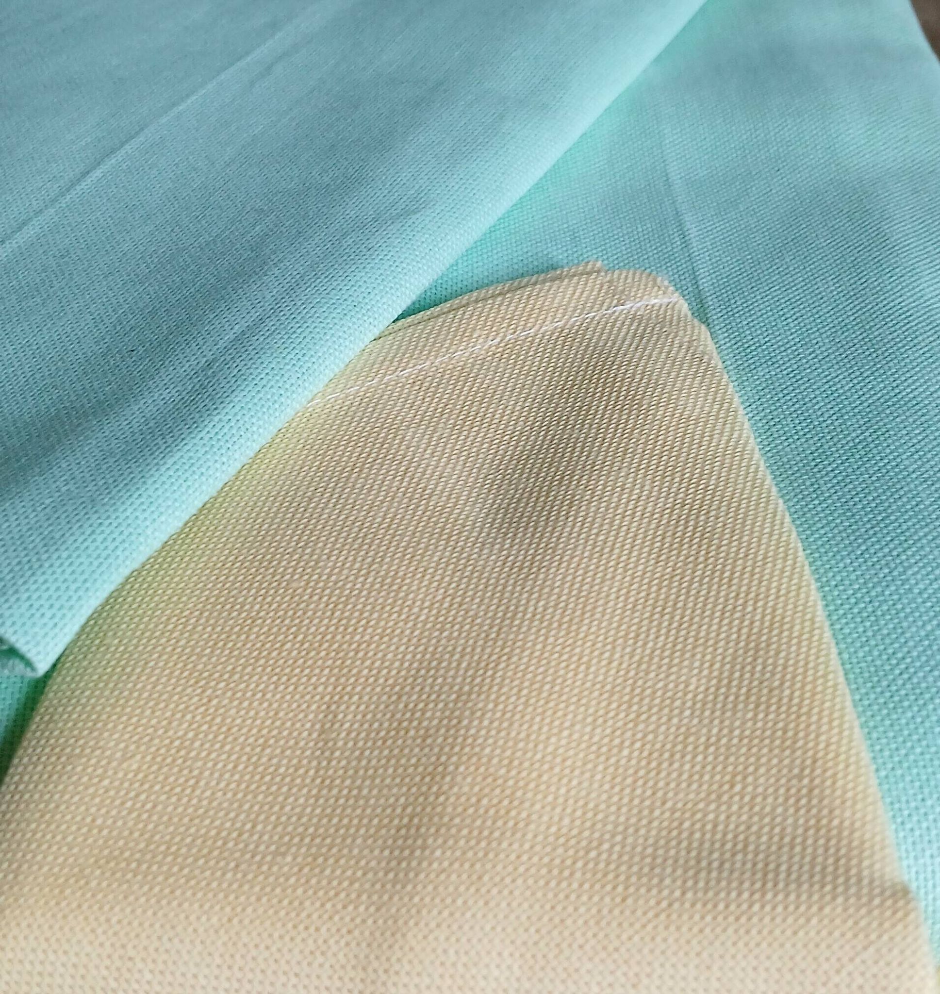 Water green tablecloth & 6 yellow napkins. France around 1980.