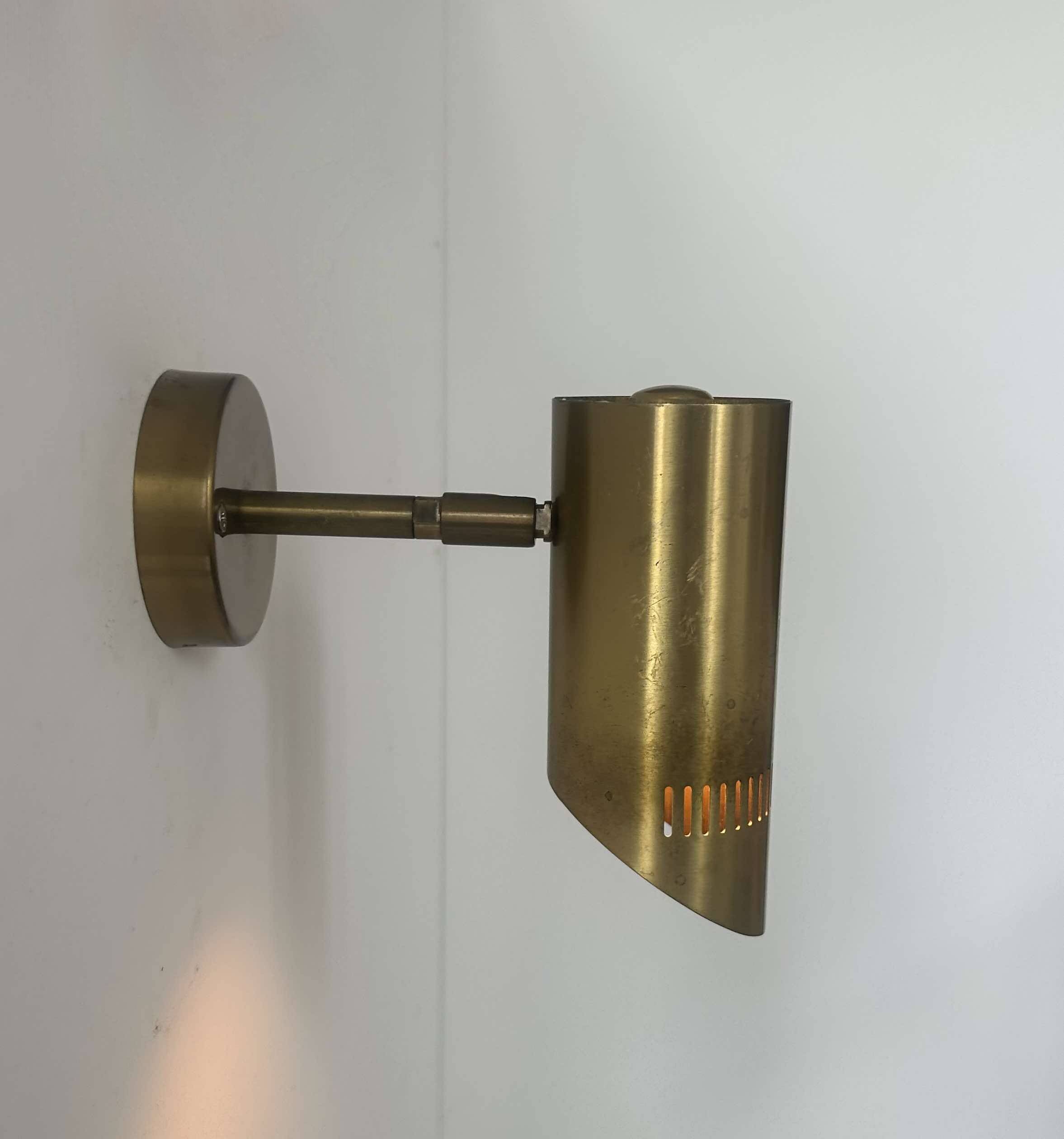 Vintage adjustable wall light, solid perforated brass, France 1960