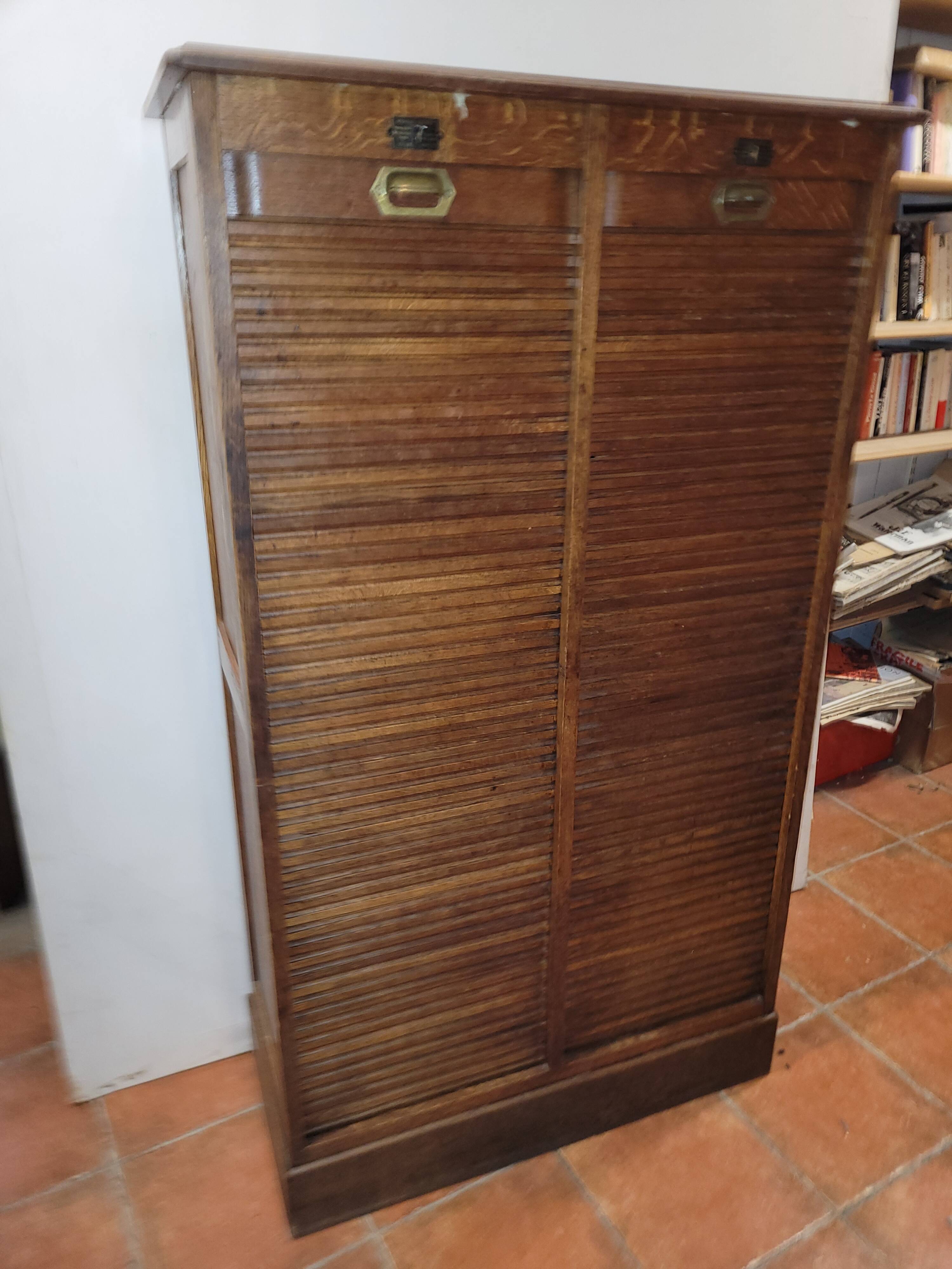 Old double curtained oak filing cabinet