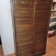 Old double curtained oak filing cabinet