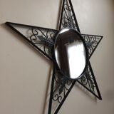 Miroir rond en fer forgé à forme d'étoile