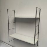 Metal string shelf