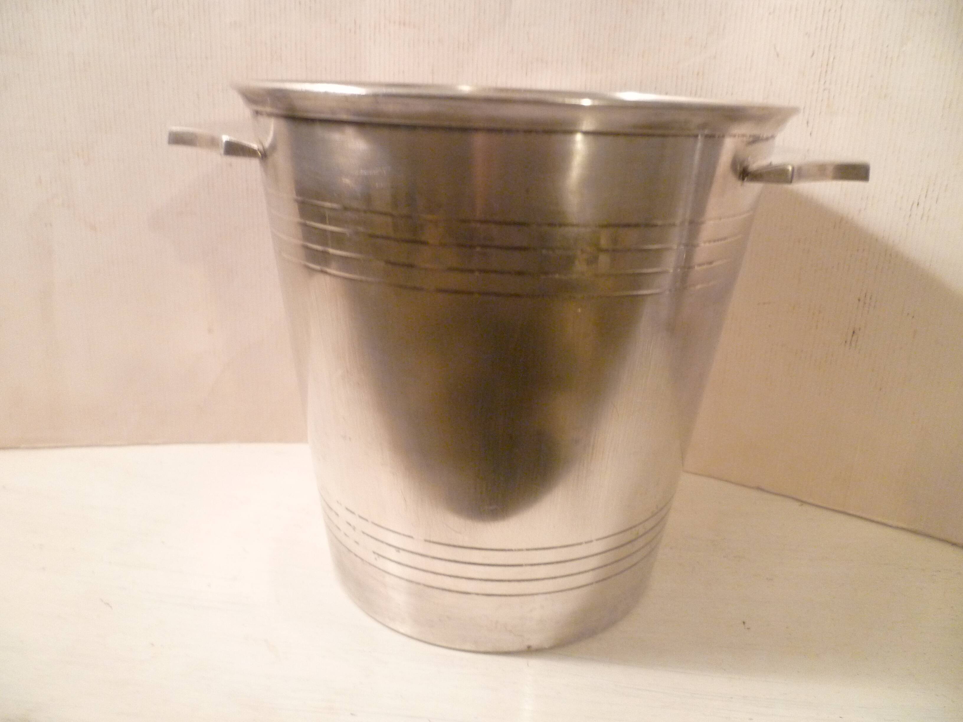 Champagne bucket / Champagne bucket design in silver-plated metal, St Medard.