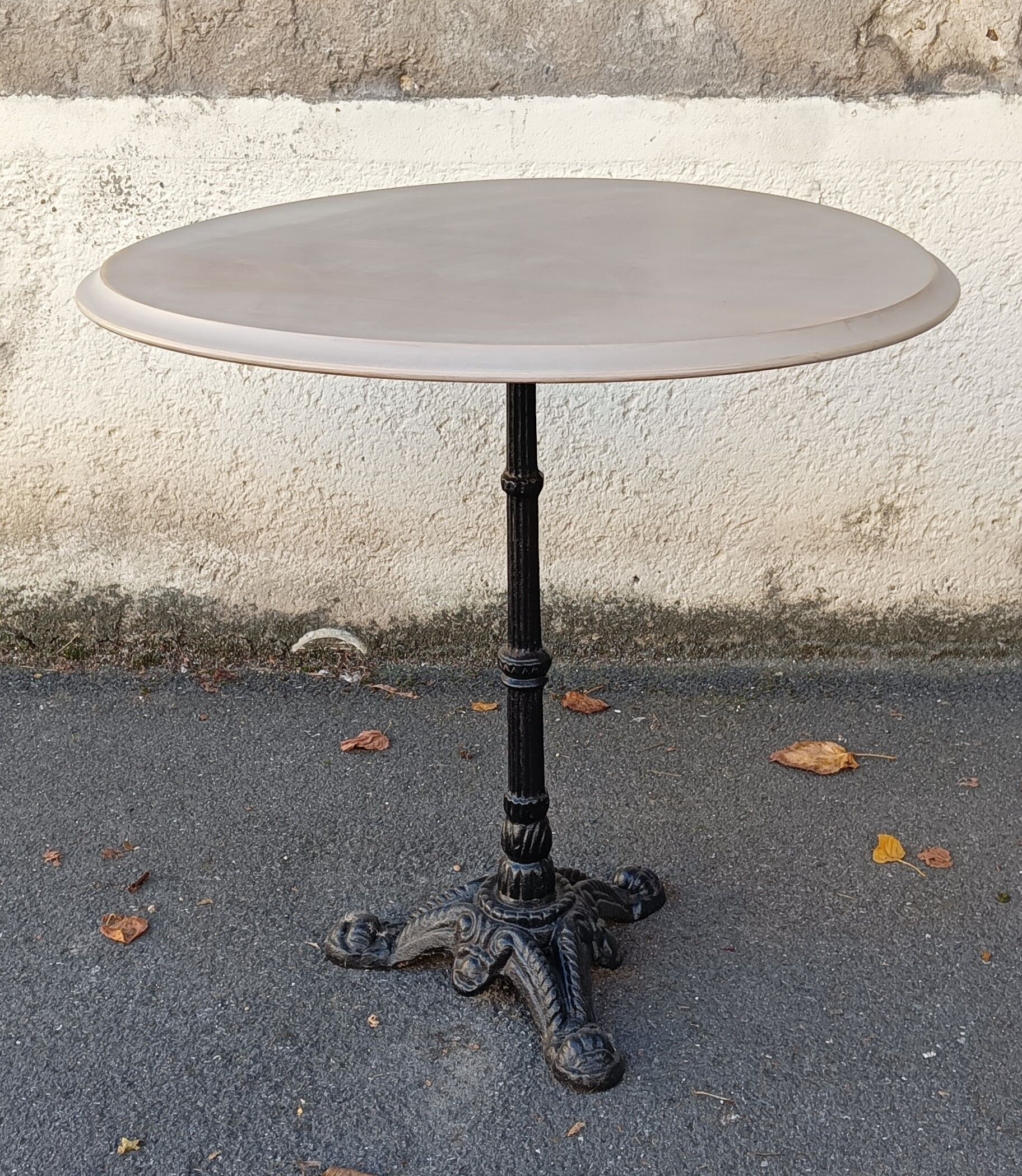Round wooden bistro table