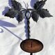 Wrought iron wall candle lamp with ancient vine leaves
