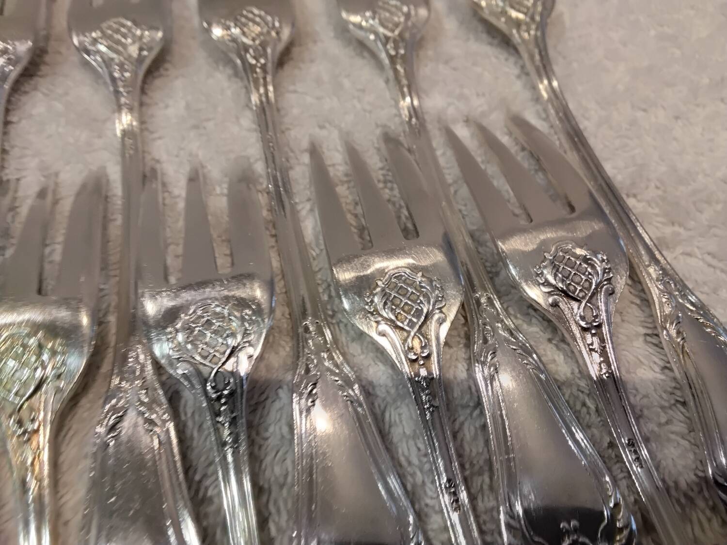11 silver-plated cake forks, goldsmith SFAM Louis XIV style