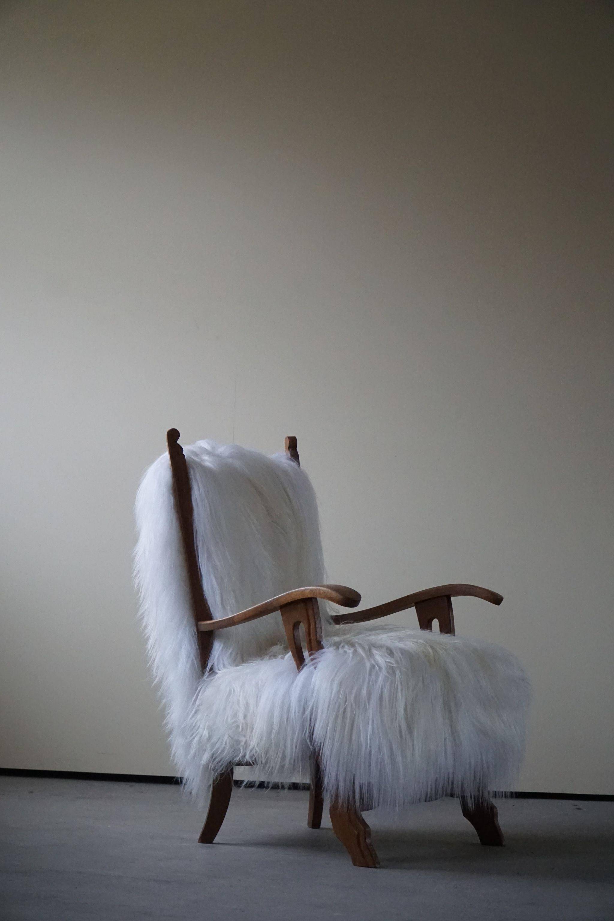 Henning Kjærnulf, armchair reupholstered in long-haired Icelandic sheepskin, 1950