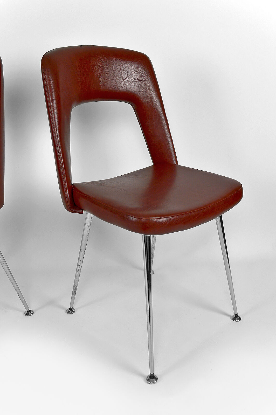 Pair of chairs in chrome and skaï, circa 1960