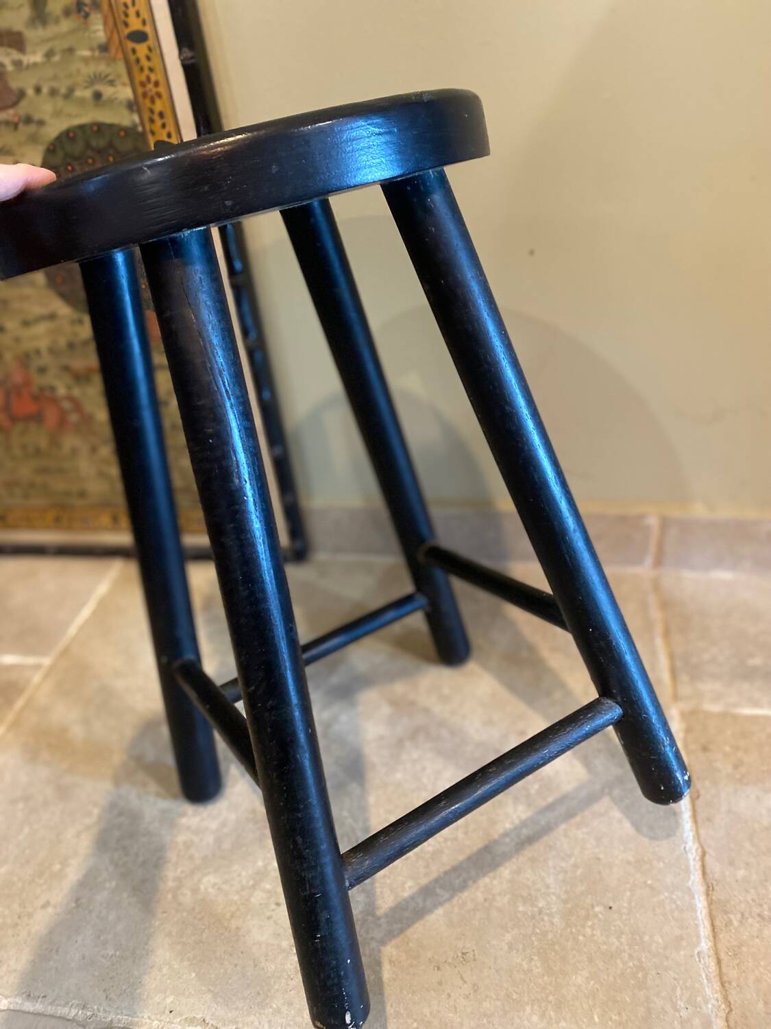 Black wooden stool