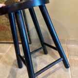 Black wooden stool