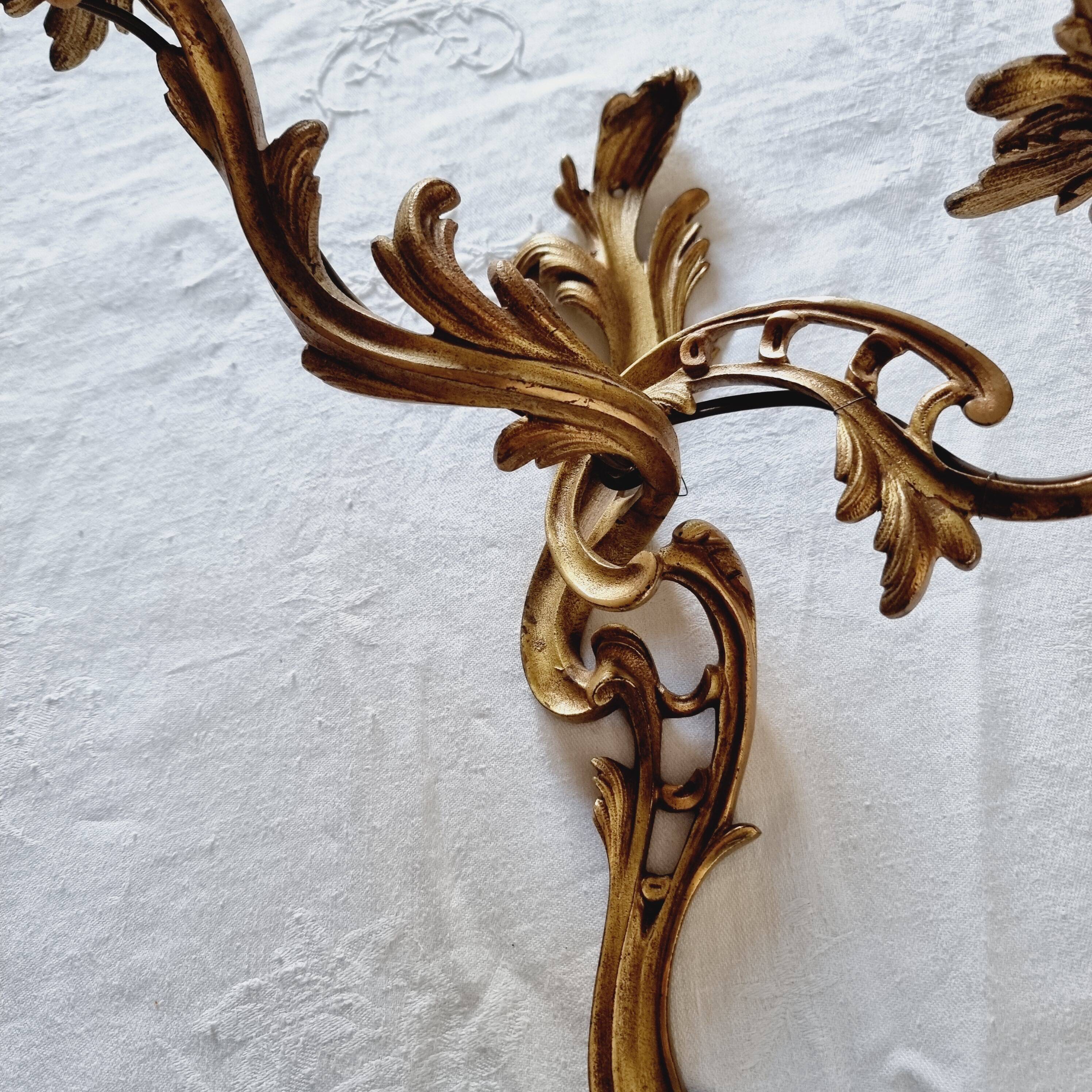 Pair of vintage French wall sconces in bronze, Louis XV Rococo style.