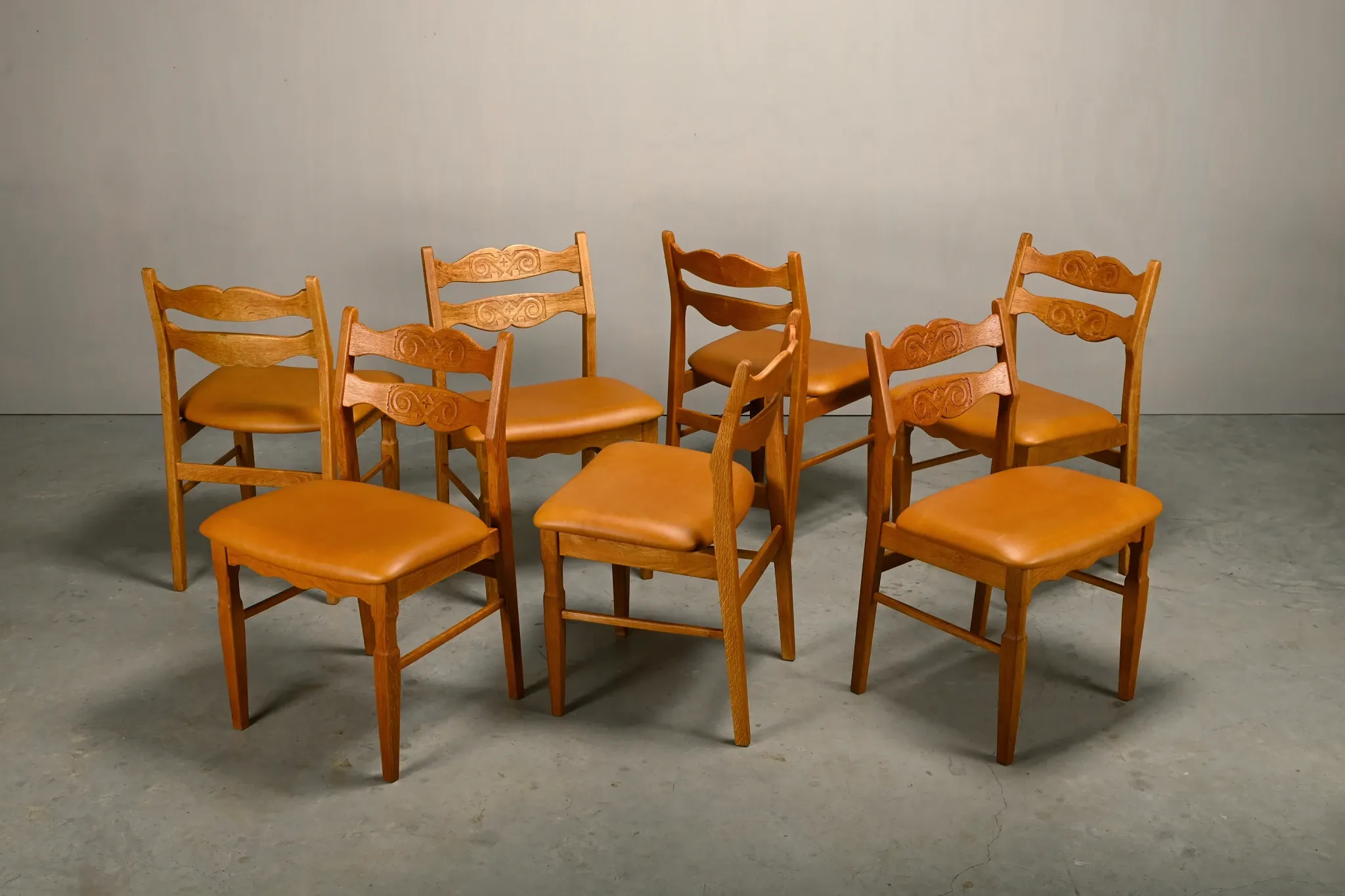 Razorblade style dining chairs by Henning Kjærnulf Oak and Leather Denmark