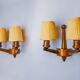 Pair of two-armed art deco "ball" wall lights, carved wood, France, 1960