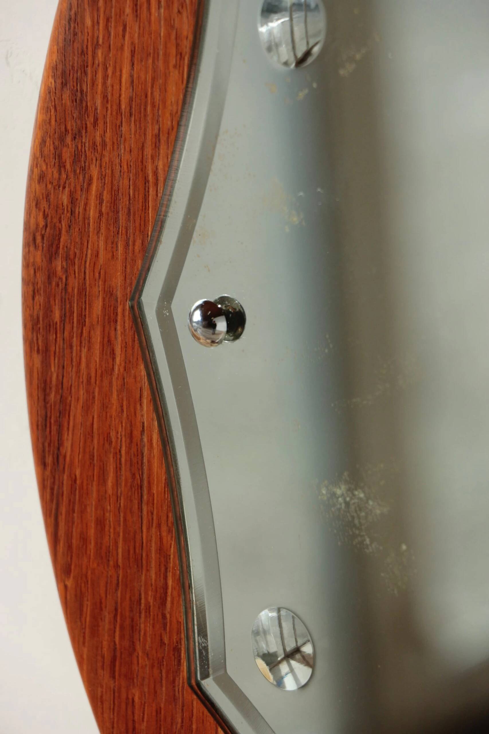 Vintage round teak mirror from the 1960s.