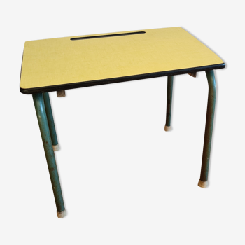 Old school desk in yellow formica