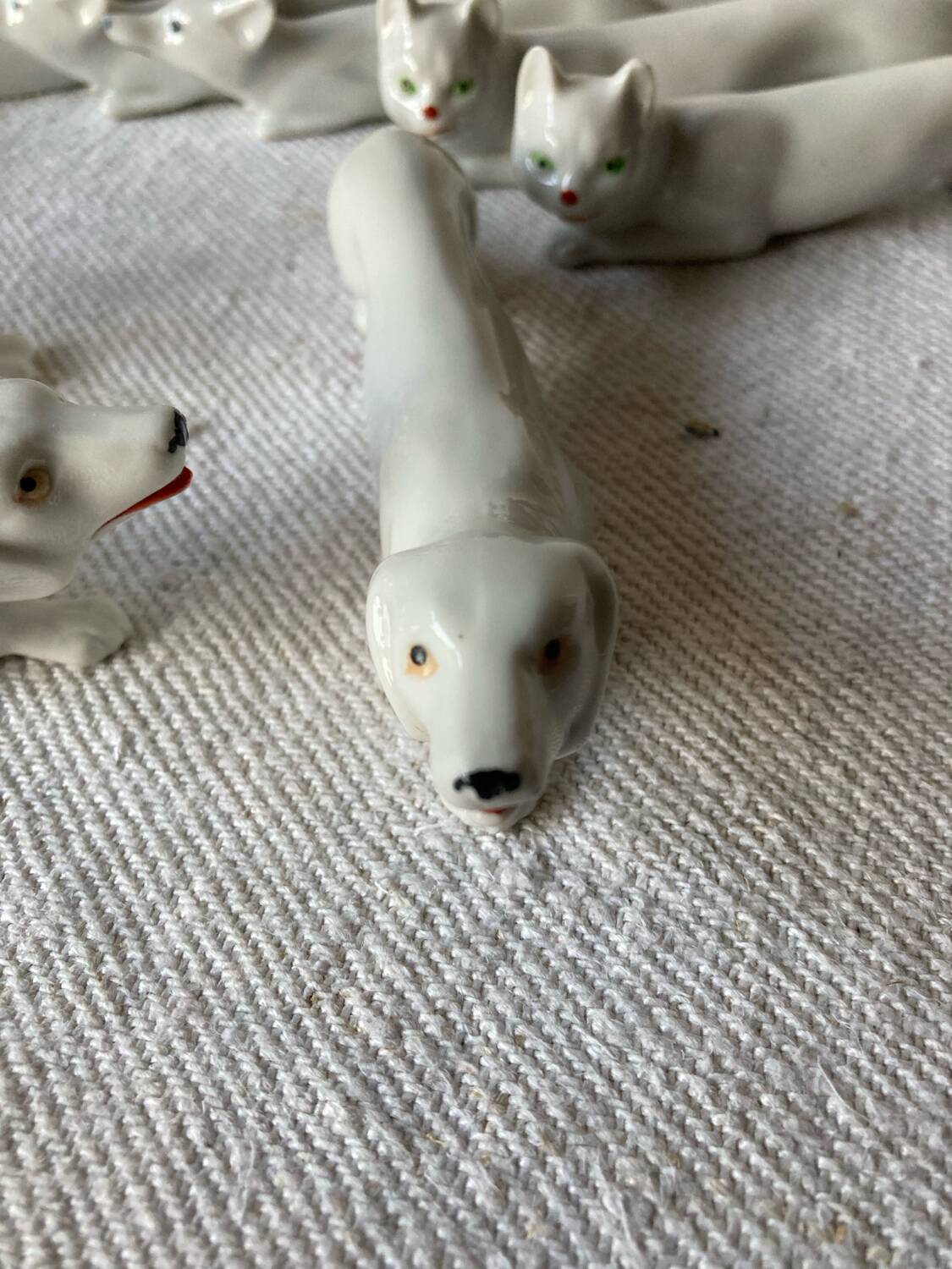 12 Art Deco porcelain knife holders