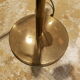 Articulated brass floor lamp