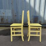 Pair of wooden and yellow formica chairs