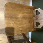 Pair of vintage wooden chairs in alpine chalet style.