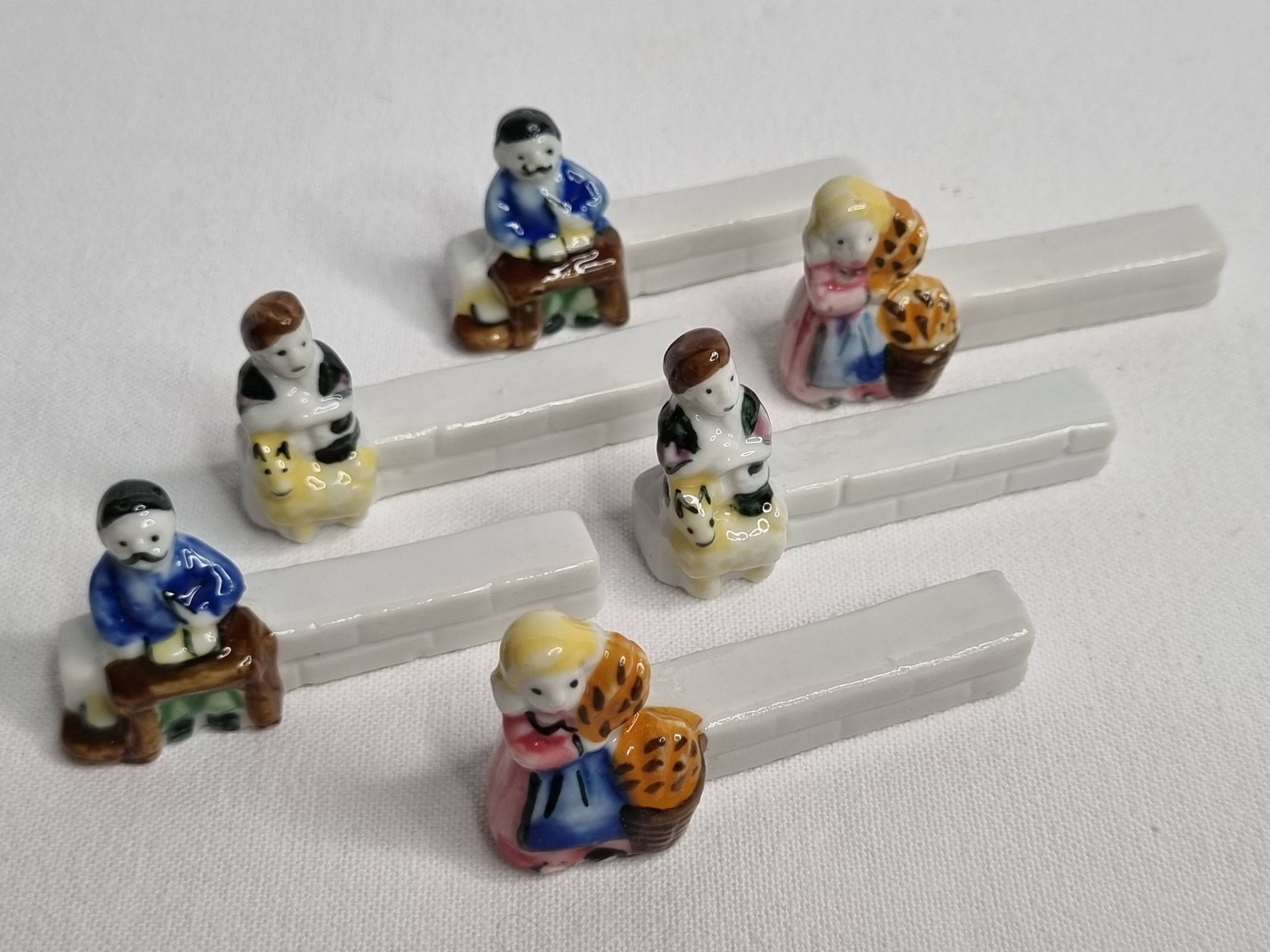 Six Le Merzer porcelain knife holders, 6 cm
