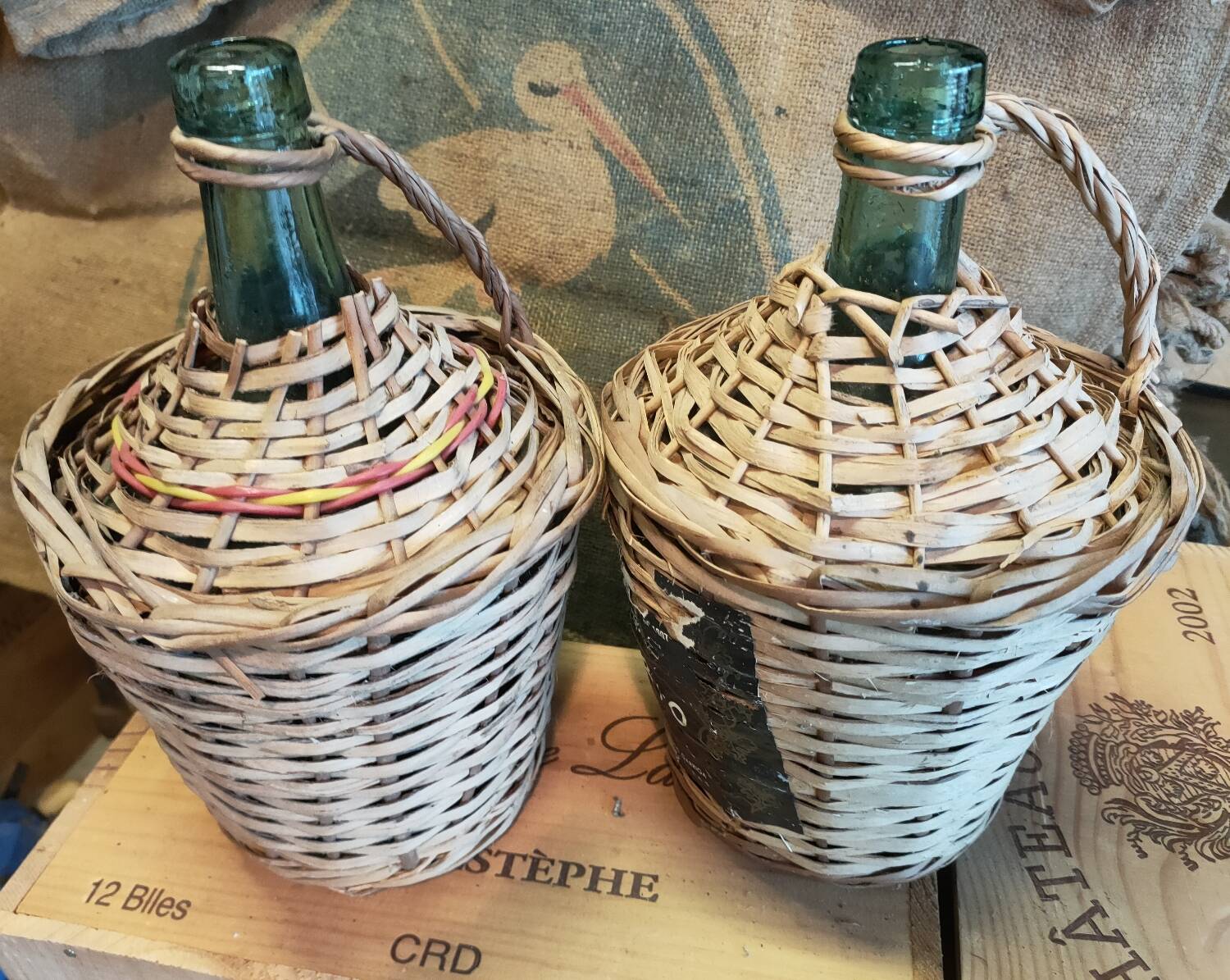 Pair of vintage demijohns