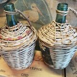 Pair of vintage demijohns