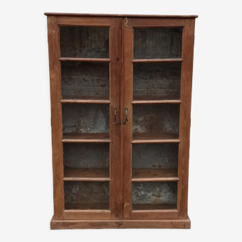 Wooden glass cabinet with metal background