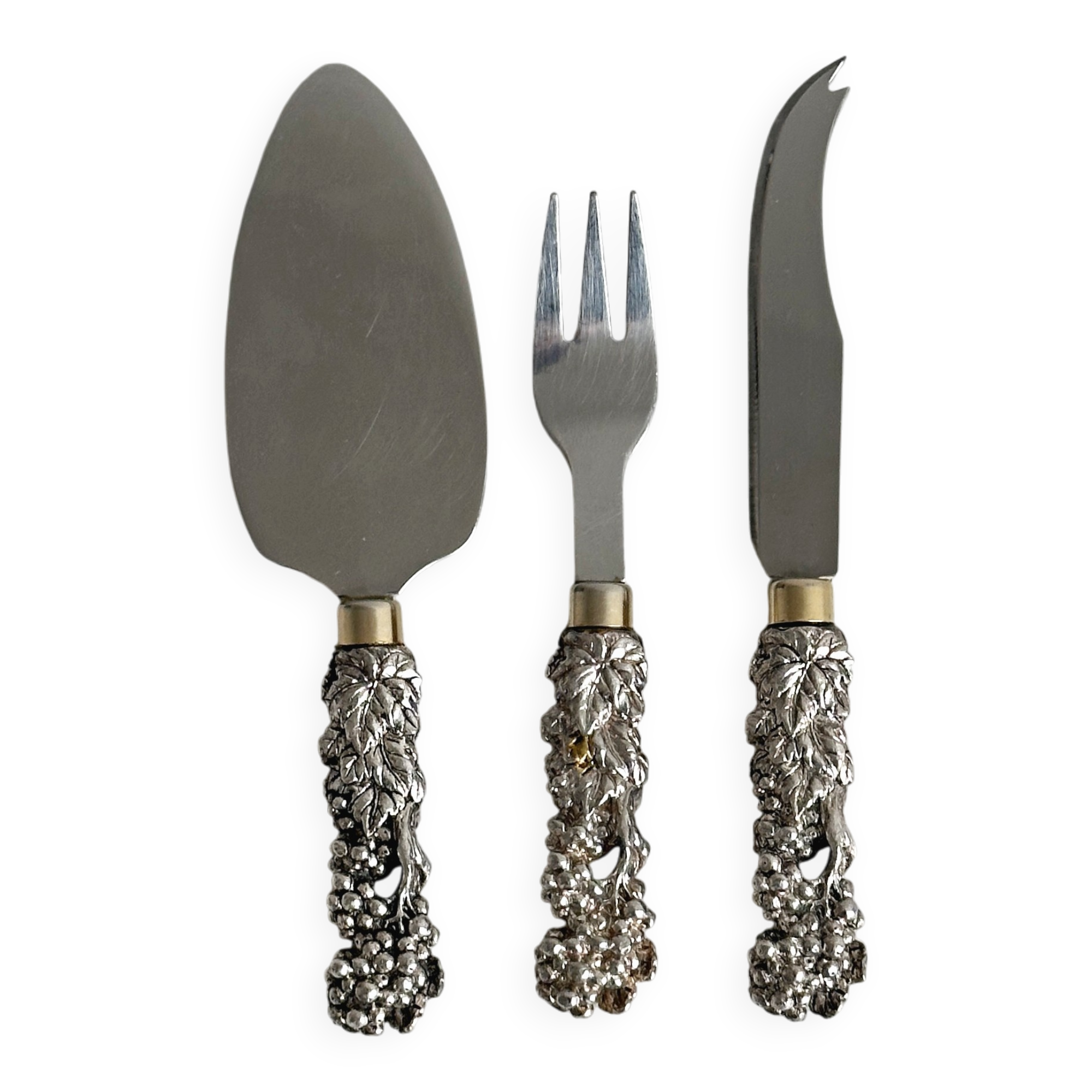 Antique shiny metal cheese cutlery
