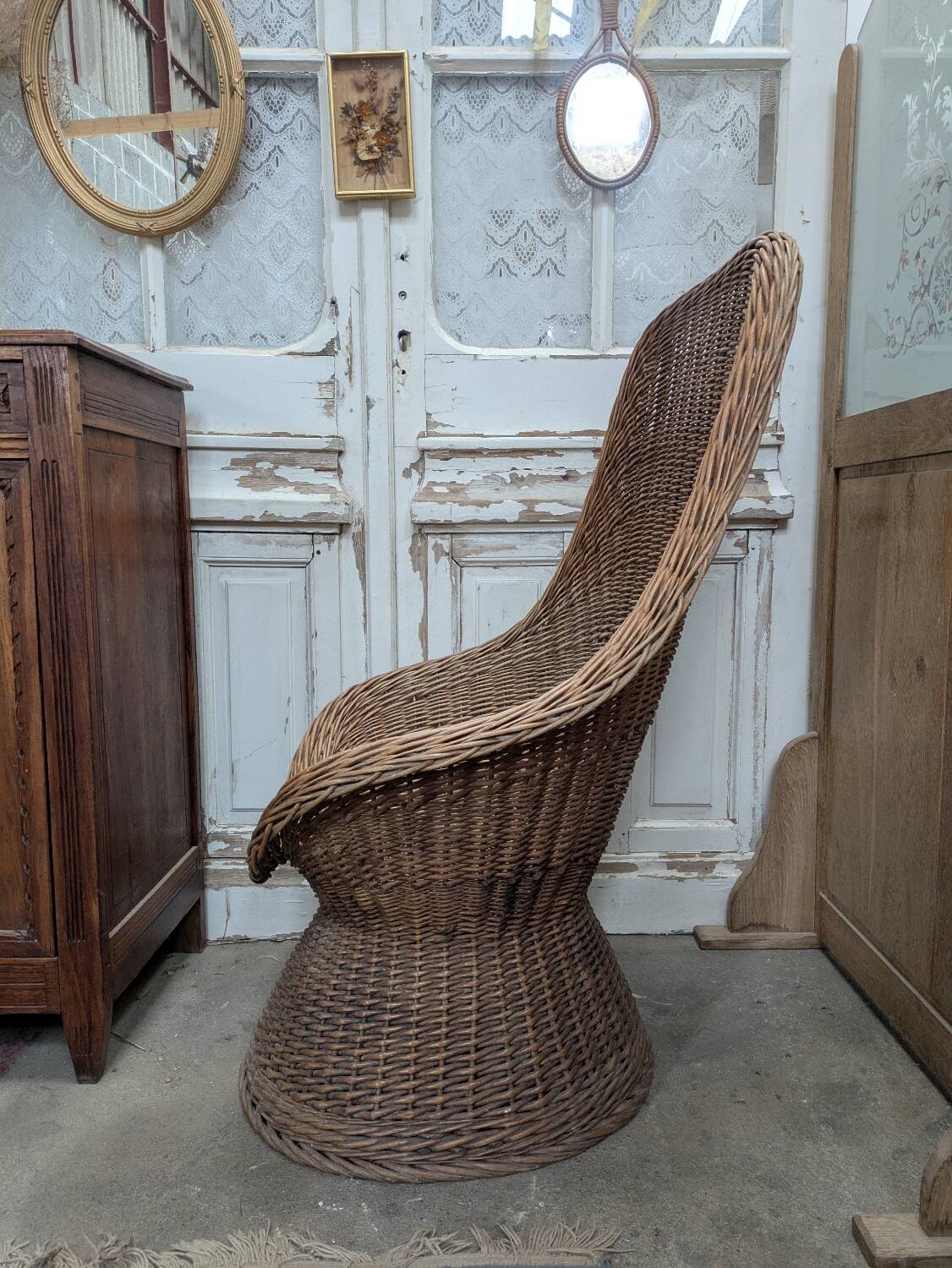 Large woven rattan armchair
