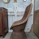 Large woven rattan armchair