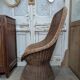 Large woven rattan armchair