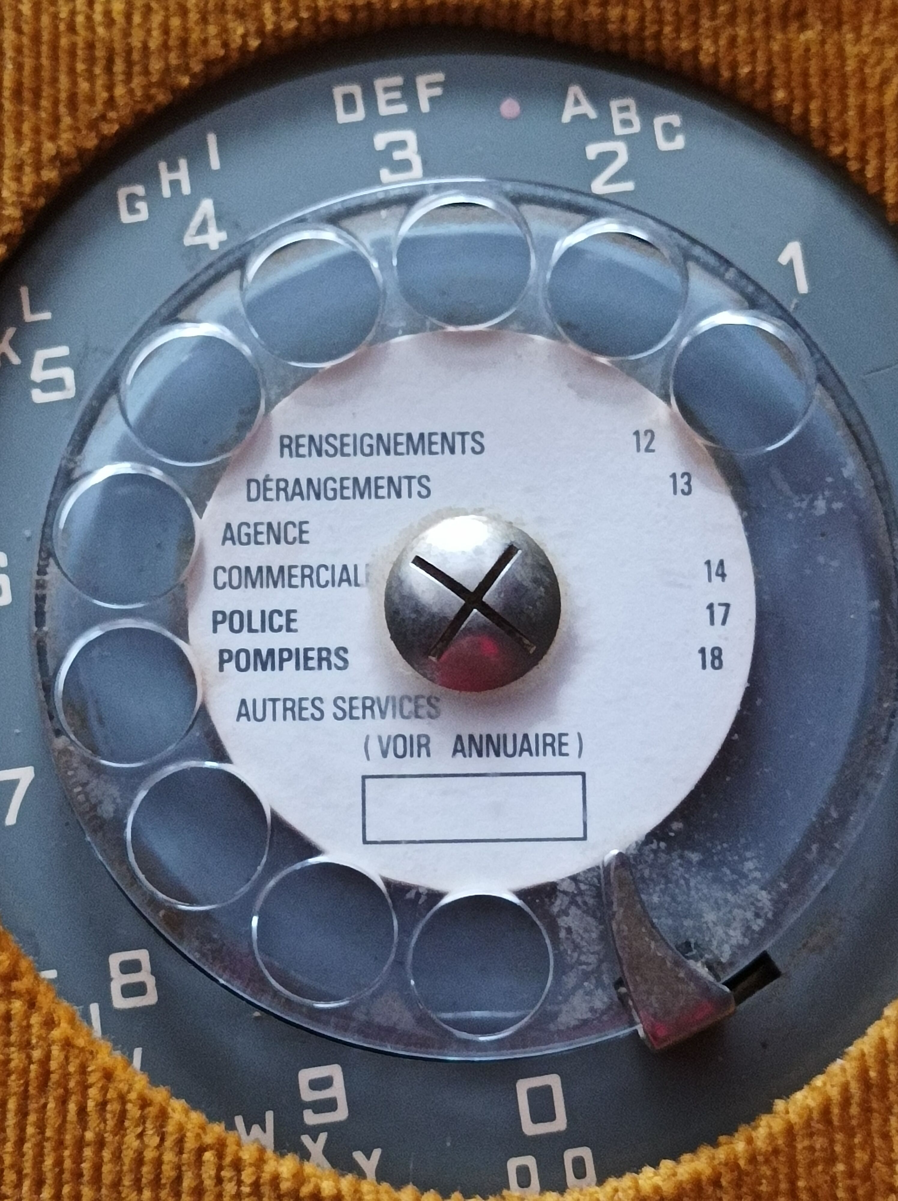 Telephone with rotary dial and its shell